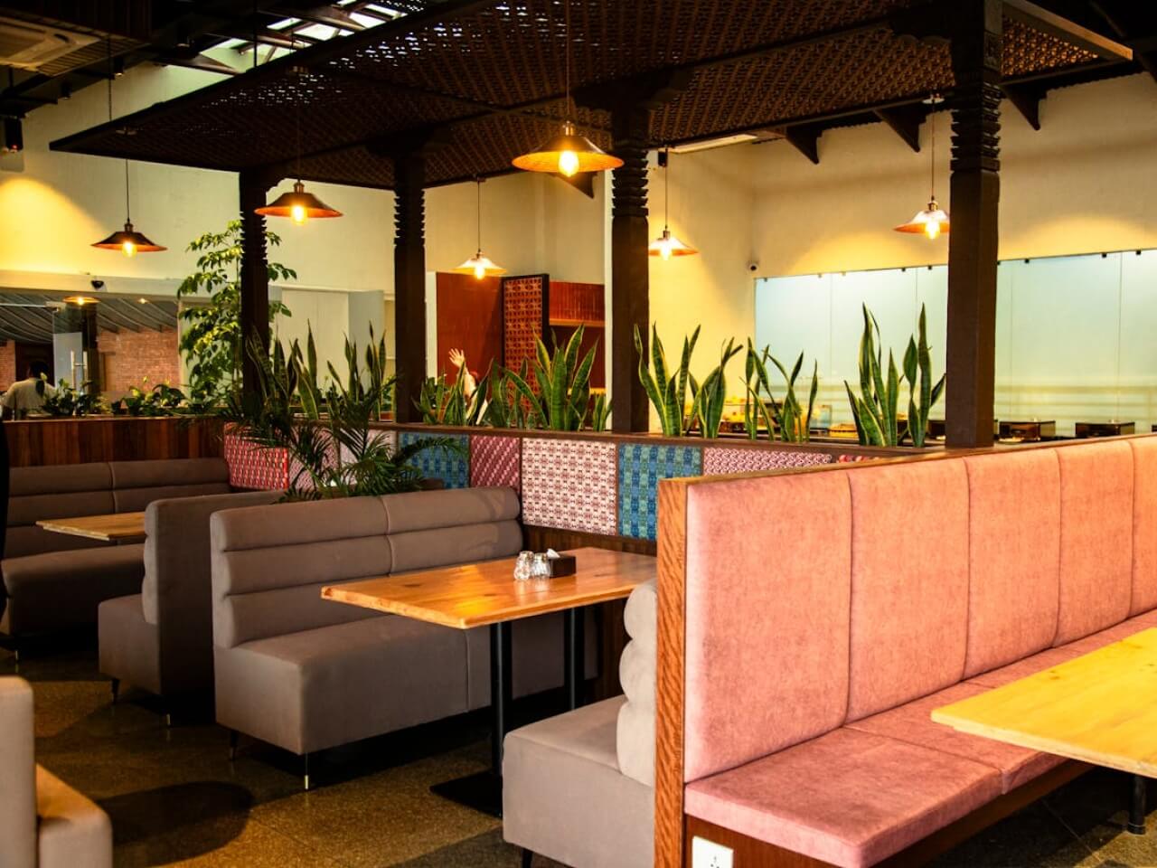 Casual dining restaurant interior with booth seating and warm lighting